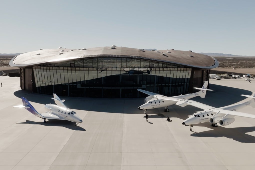 The Virgin Galactic spacecraft VSS Unity (left) parks outside Spaceport America in New Mexico. The Richard Branson-founded venture is now discreetly soliciting interest in Asia for its space tourism flights, which will restart on new spaceships in 2026. Photo: Virgin Galactic