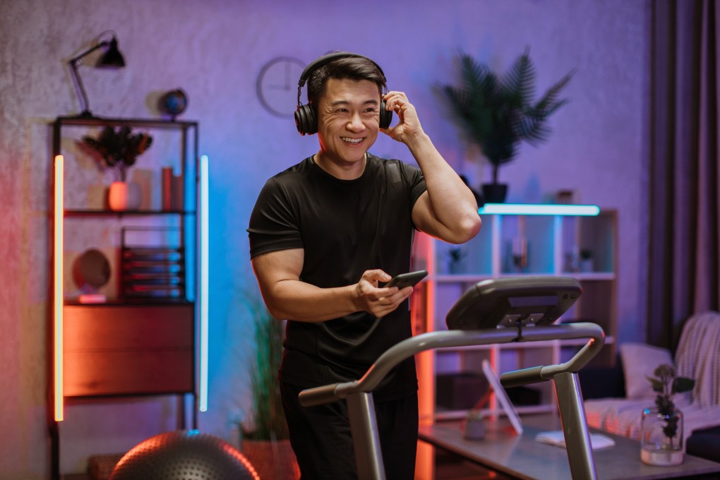 Pairing a new habit with something you have to do or want to do, such as running on a treadmill while listening to a podcast, can help you remain consistent. The practice is known as habit stacking. Photo: Shutterstock