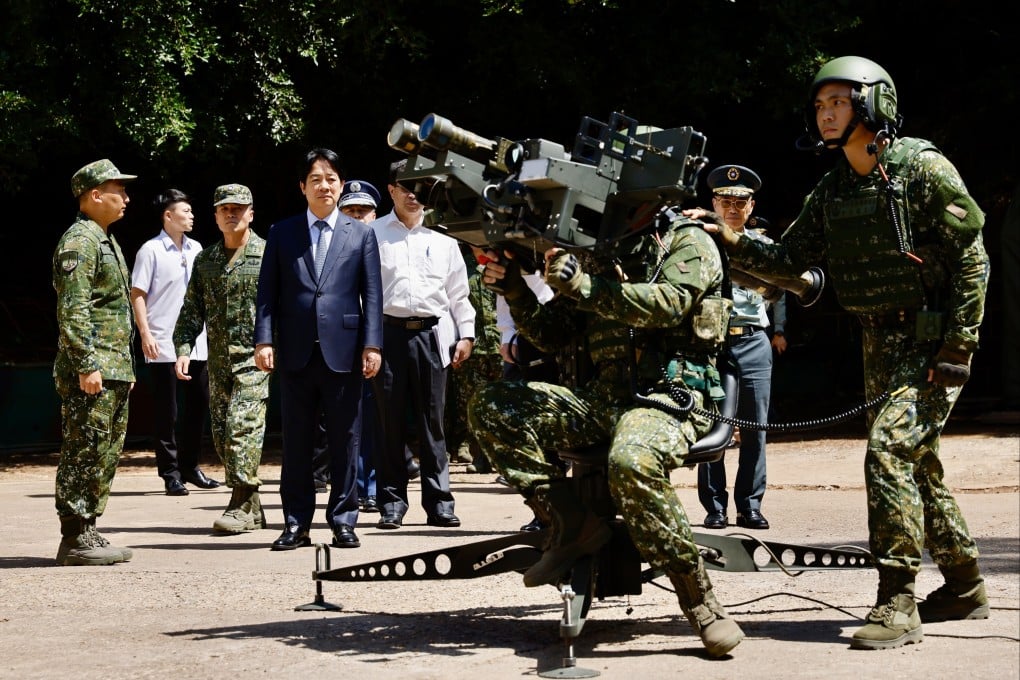 Taiwanese leader William Lai, who has proposed a 6 per cent increase in the defence budget, watches a missile launcher demonstration at an army base in Taiwan’s Penghu county on Friday. Photo: EPA-EFE
