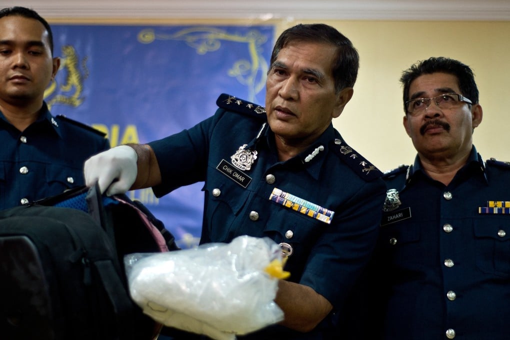 Malaysian customs officials show drugs seized from a passenger at Kuala Lumpur International Airport in 2014. Photo: AFP