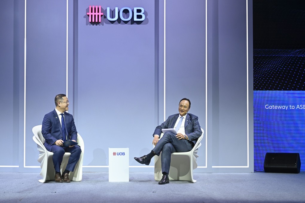 Chin (right) discusses the regional trade outlook with Kevin Huang, COO of SCMP, at the UOB Gateway to Asean Conference in Ho Chi Minh City last week. Photo: Handout