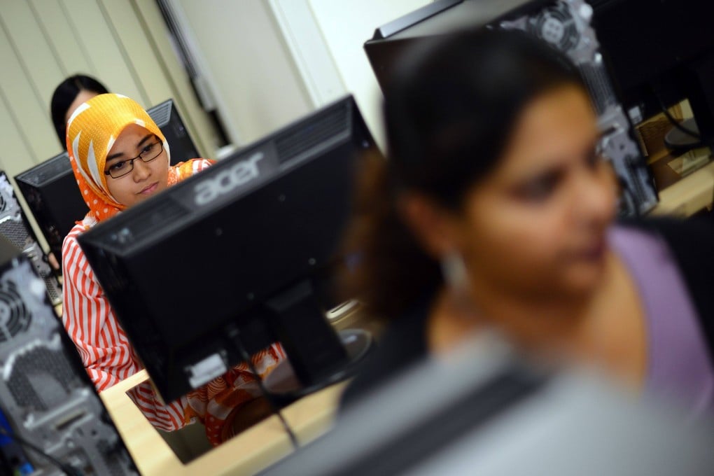 Students use computers to prepare for exams in Kuala Lumpur. Authorities claimed the DNS policy was necessary to combat online gambling, pornography, copyright violations and financial scams. Photo: AFP