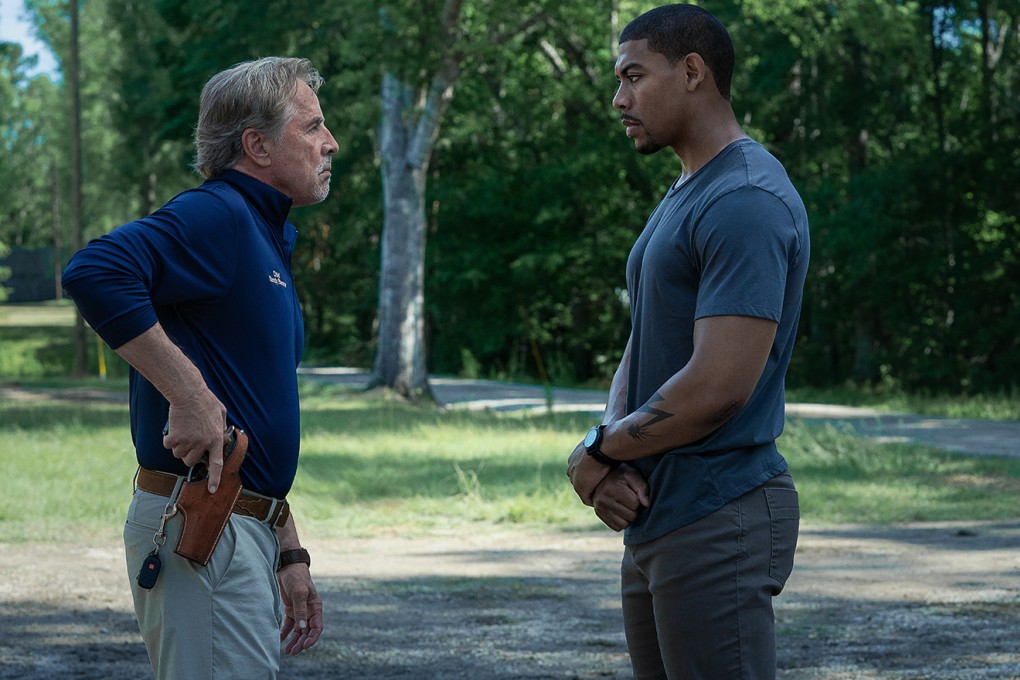 Aaron Pierre as Terry Richmond (right) and Don Johnson as  Chief Sandy Burnne in a still from Netflix thriller Rebel Ridge. Photo: TNS