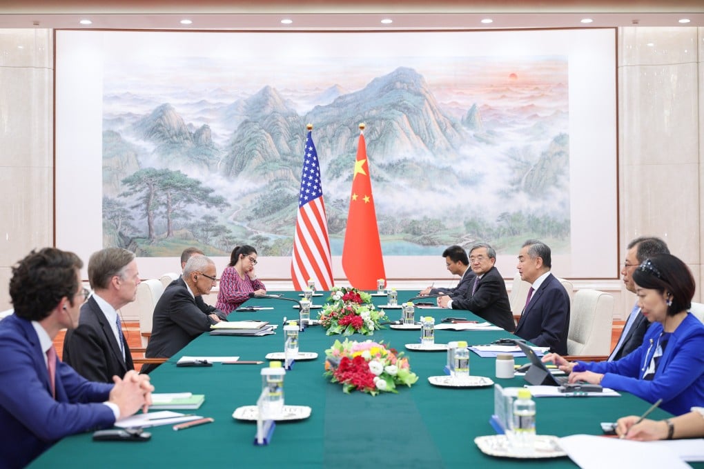 Chinese Foreign Minister Wang Yi meets US climate envoy John Podesta in Beijing on September 6. Wang said the climate dialogue sent “a positive signal to the outside world”. Photo: Xinhua