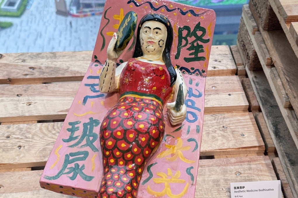 “Aesthetic Medicine Bodhisattva” is a giver of good skin. This is one of the new gods for the 21st century created by Chinese artist Zhang Xiao, currently on show at the Guangdong Times Museum in Guangzhou. Photo: Zhang Xiao