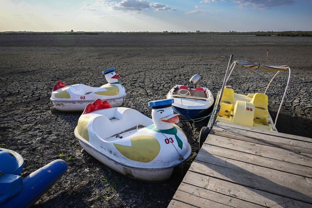 Pedal boats are seen on the bed of a dried out lake in the village of Comana, Romania, on September 7. The EU’s Copernicus Climate Change Service has warned that it is “increasingly likely” 2024 will be the hottest year on record. Photo: AFP