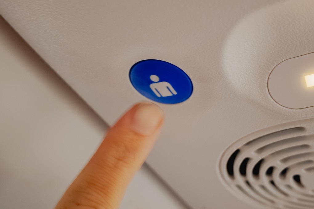 Warning the cabin crew that you are feeling ill is a top priority during an on-flight medical emergency. Photo: Shutterstock