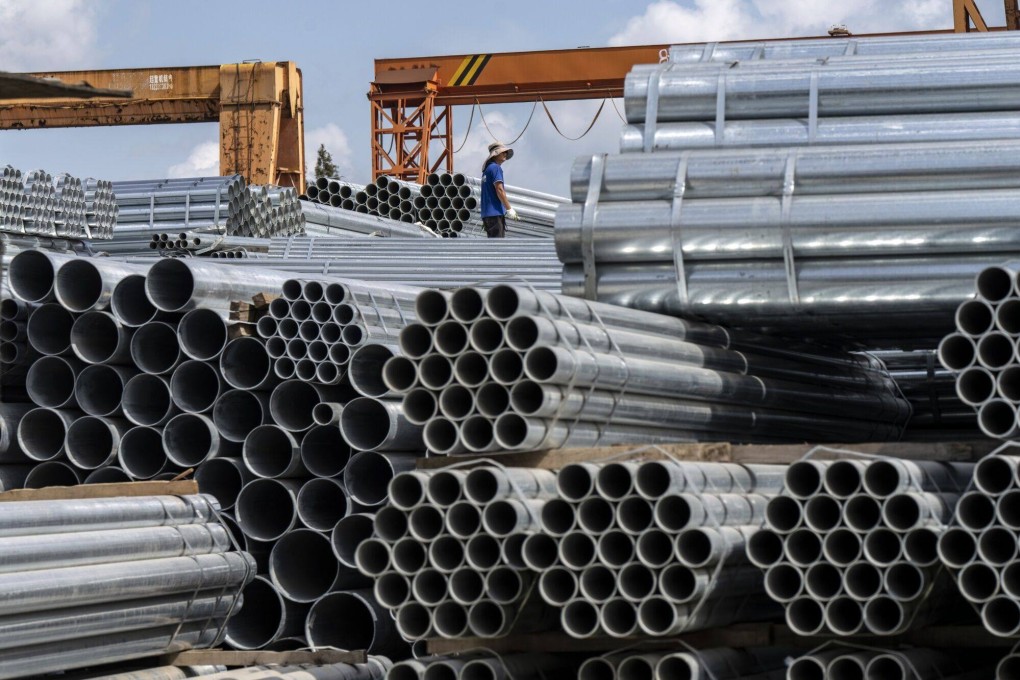 Bundles of steel tubes are stacked at a trading market near Shanghai on August 19, 2024. Photo: Bloomberg