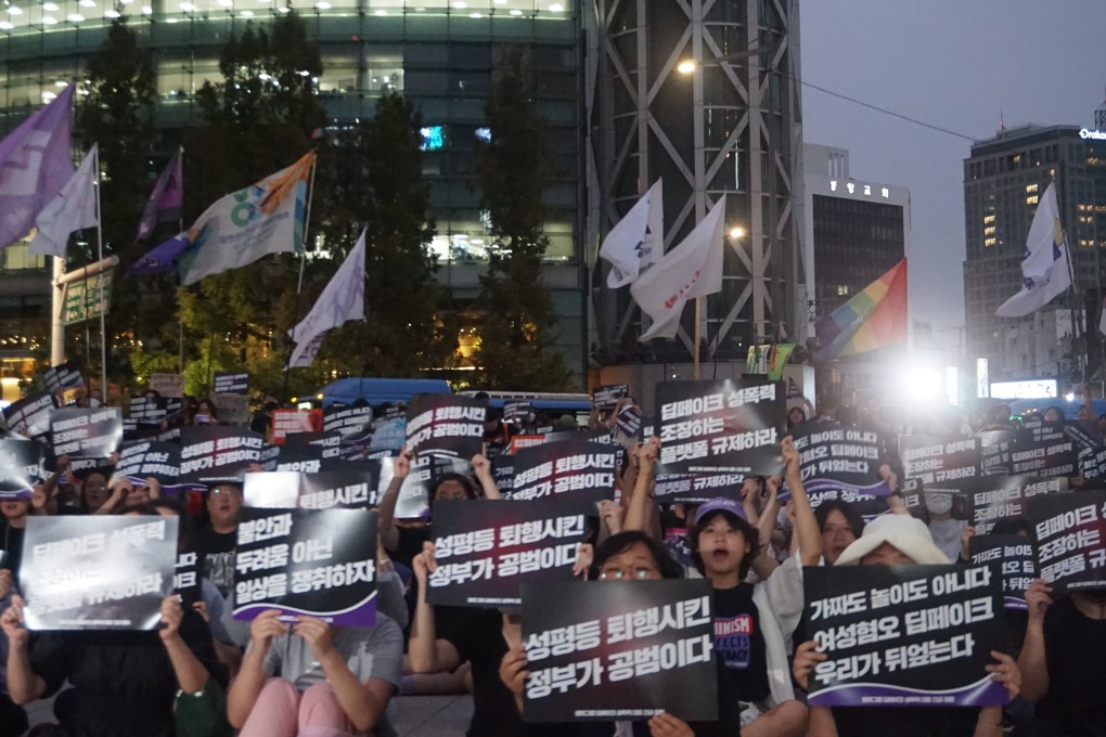 Activists protest against deepfake content and demand government action in Seoul on Friday. The banners read “Regulate internet platforms that encourage deepfake sexual crimes”. Photo: David D. Lee