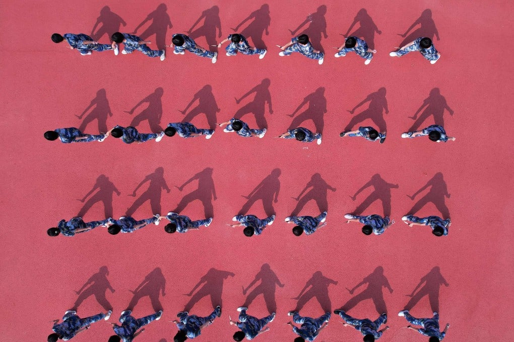 High school students taking part in a military education and training session in Handan, Hebei province. Photo: AFP