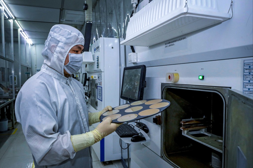 An employee working at a semiconductor chips factory in Huai’an, in eastern China’s Jiangsu province. Photo: AFP