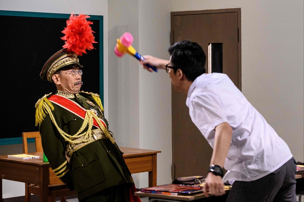 Hong Kong actors Ng Chi-sum (left) and Tsang Chi-ho, in an episode of the RTHK satirical TV show “Headliner”, now suspended. Photo: AFP