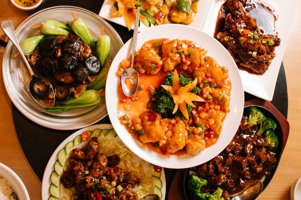 A selection of dishes at Happy Garden, in Darwin, Australia. The Chinese restaurant is one of 10 featured in Chopsticks or Fork?, a cookbook of 32 food recipes from across the country that tell the stories of the Chinese-Australians behind them. Photo: Jennifer Wong