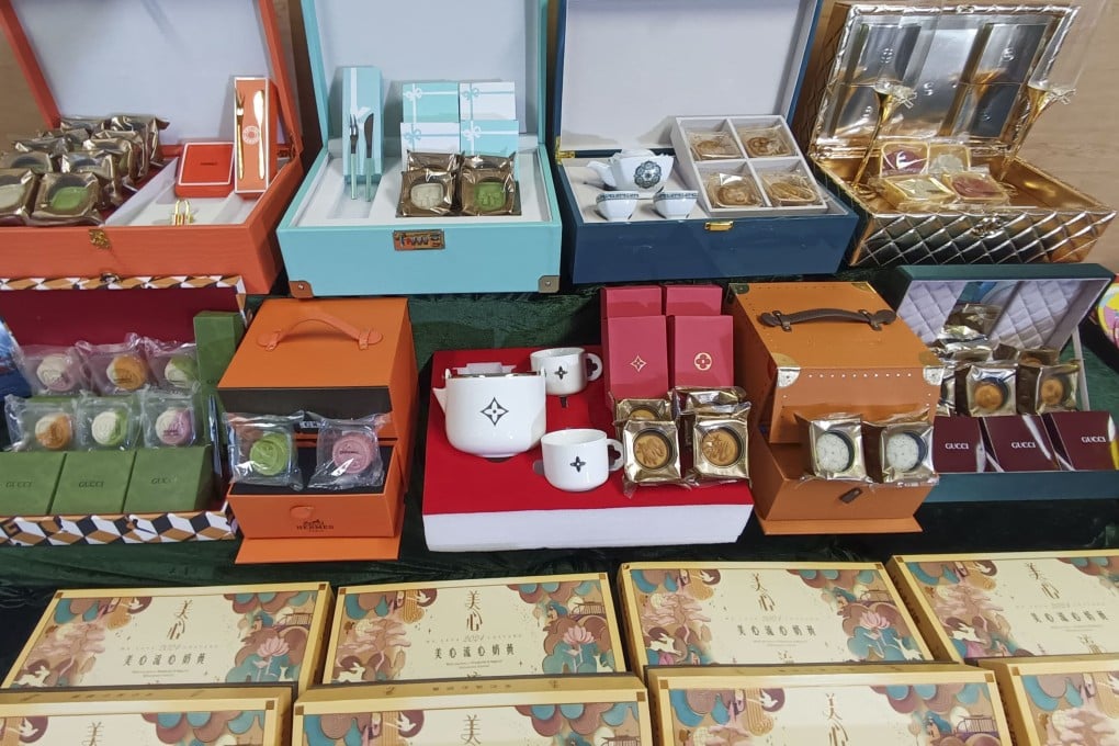 A 21-year-old woman has been arrested for selling counterfeit Hermes, Chanel, Gucci and Louis Vuitton mooncakes and tableware. Photo: SCMP