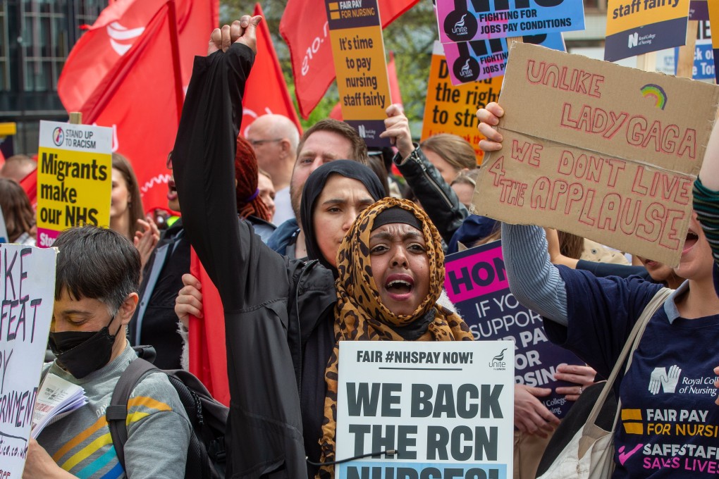 NHS workers march in London during a nurses’ strike over pay and working conditions. The state-run NHS has been in crisis and endured some of its toughest winters in recent years. Photo: EPA-EFE