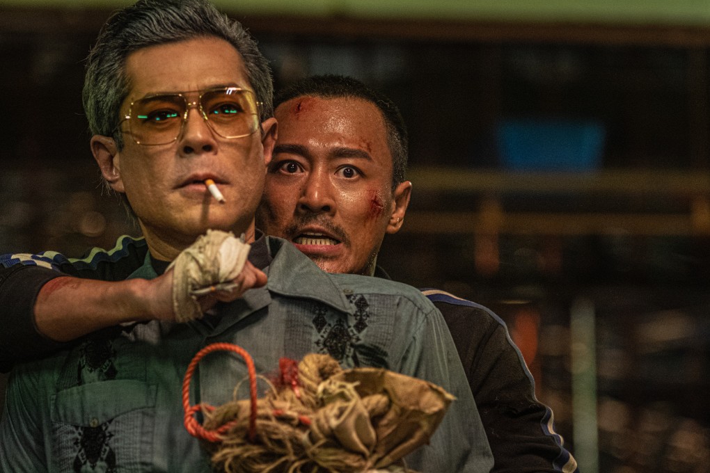 Louis Koo (left) and Raymond Lam in a still from Twilight of the Warriors: Walled In, Hong Kong’s highest-grossing movie, available to stream on Disney+ this weekend.