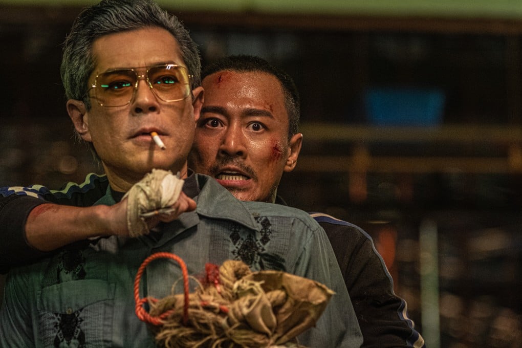 Louis Koo (left) and Raymond Lam in a still from Twilight of the Warriors: Walled In, Hong Kong’s highest-grossing movie, available to stream on Disney+ this weekend.