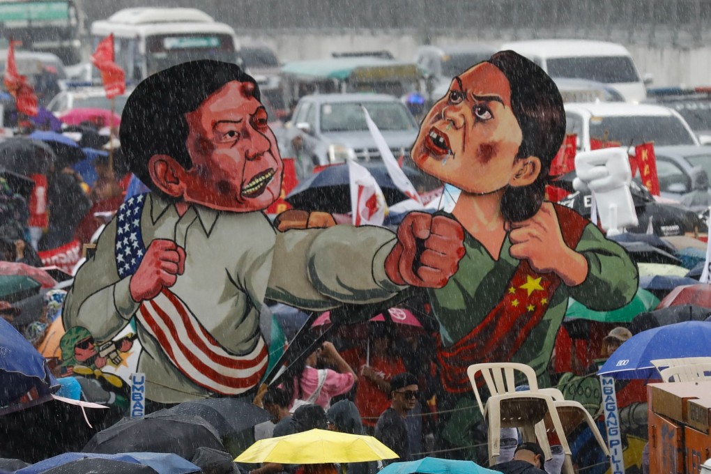 Cutouts of President Ferdinand Marcos Jnr and VP Sara Duterte-Carpio displayed at a protest along a road leading to the Philippine Congress in Quezon City. Photo: EPA-EFE