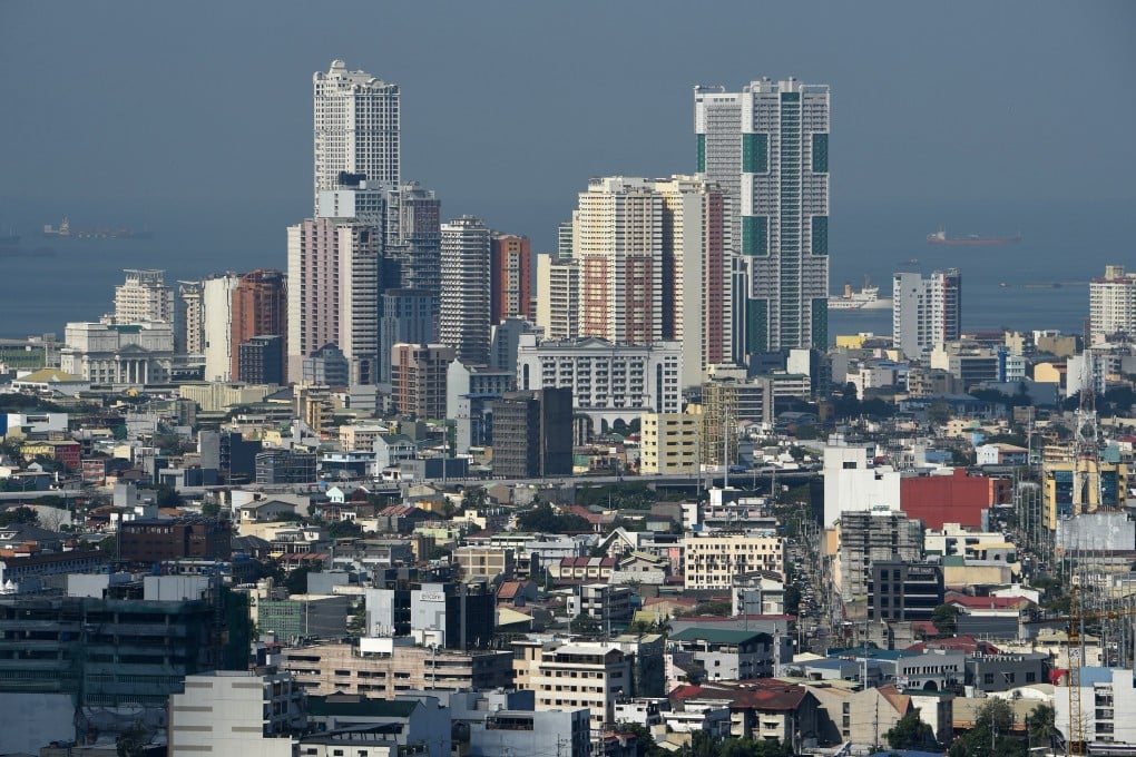 Manila’s skyline. A woman was allegedly sexually assaulted inside a car she booked via a ride-hailing app in the Philippine capital. Photo: AFP