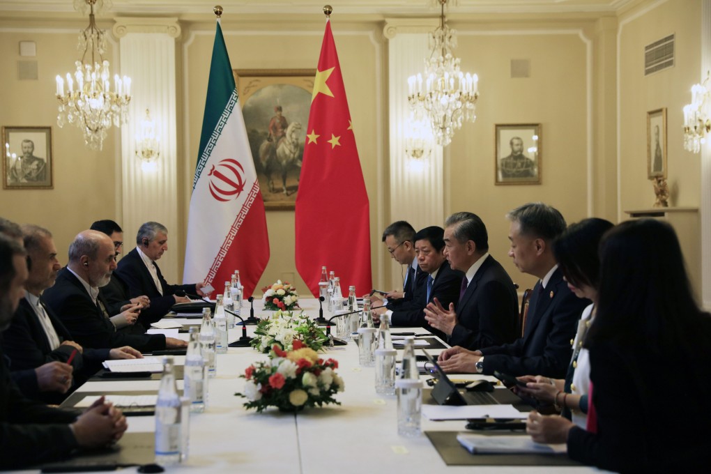 Chinese Foreign Minister Wang Yi (fourth from right) holds talks with Iran’s Supreme National Security Council Secretary Ali Ahmadian (third from left) on Thursday in St Petersburg, Russia. Photo: Handout via Xinhua