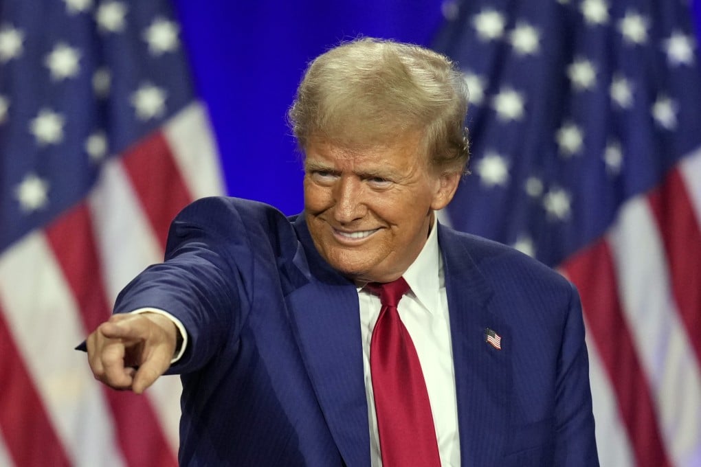 Republican presidential nominee Donald Trump points to a person in the crowd at an event in La Crosse, Wisconsin, in August. Photo: AP