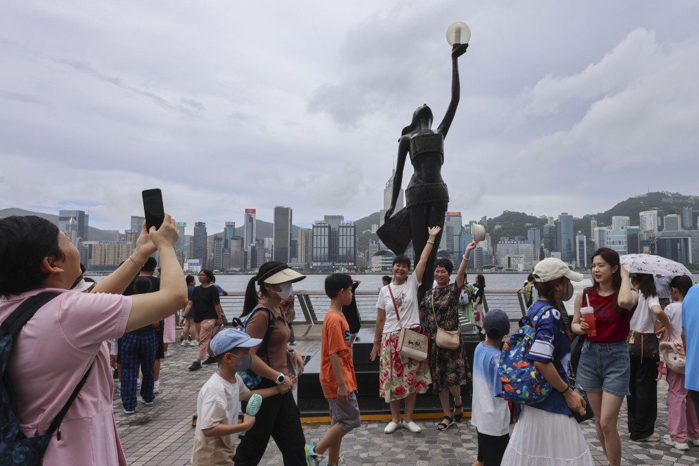 Tourists visit the Avenue of Stars in Tsim Sha Tsui, on July 16. Photo: Jelly Tse