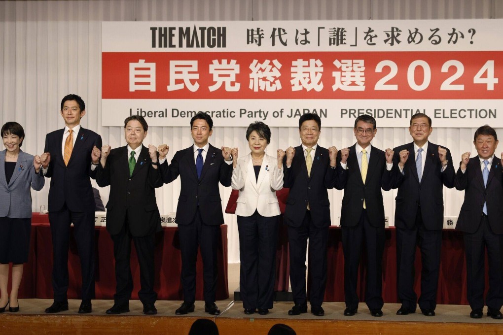 The nine candiates for leader of the LDP pose at the party’s headquarters in Tokyo. Photo: EPA