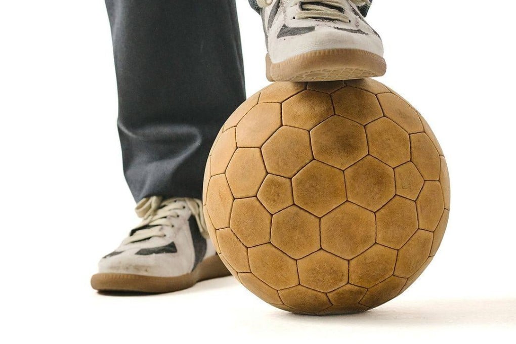 The Original 92, handmade using Italian leather, was the first football sold by 12 Pentagons, after co-founder Jon-Paul Wheatley’s videos of him making footballs went viral on TikTok. Photo: Instagram/jonpaulsballs