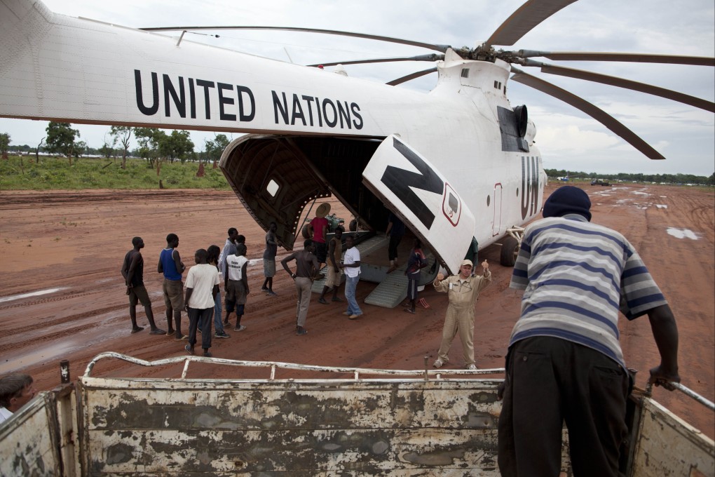 A World Food Programme truck backs up to load food items from a recently landed UN helicopter, in Yida camp, South Sudan, on Saturday. Photo: AP