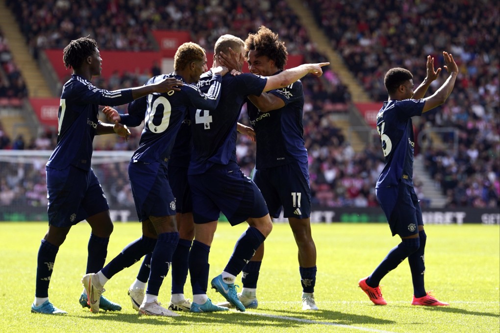 Manchester United’s Matthijs de Ligt (centre) celebrates with team mates after scoring his side’s first goal against Southampton at St Mary’s Stadium. Photo: DPA