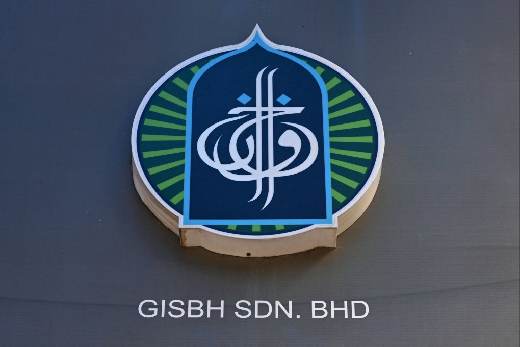The logo of Global Ikhwan Services and Business (GISB) is pictured on side of a GISB office building in Rawang, outside Kuala Lumpur, on September 12, 2024. Photo: AFP