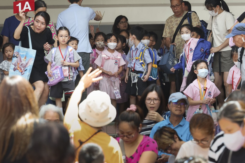 Children leave Taikoo Primary School in Quarry Bay on September 5. Dwindling numbers of students in primary schools across Hong Kong are leading education authorities to consolidate and shut down some schools. Photo: Dickson Lee