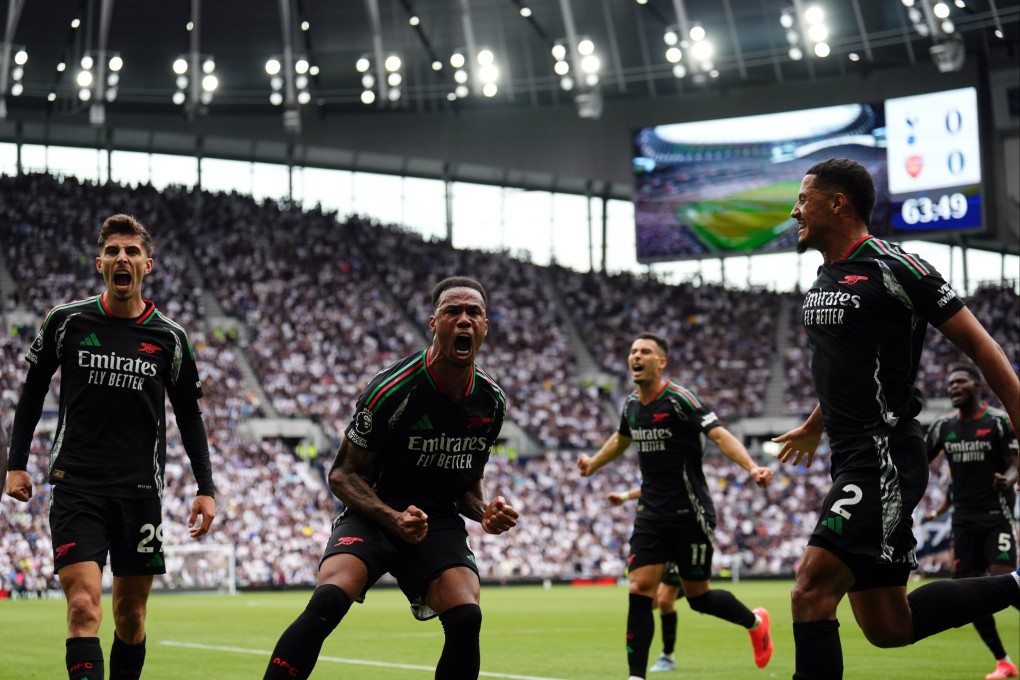 Arsenal’s Gabriel (centre) celebrates scoring his side’s winner against  Tottenham. Photo: DPA