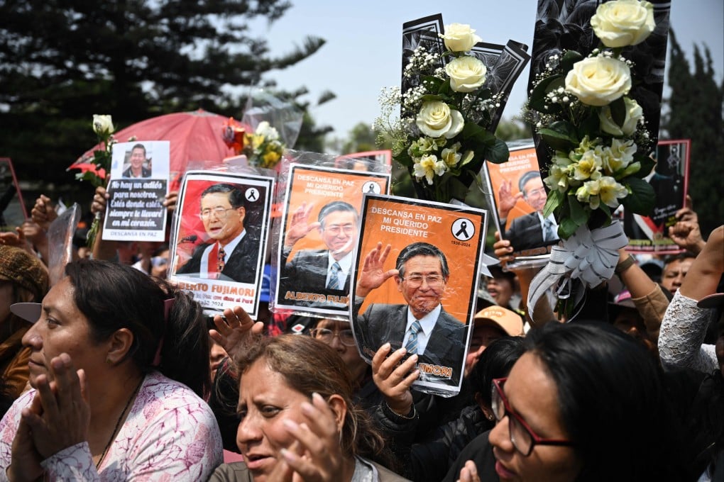 People attend the funeral of ex-Peruvian president Alberto Fujimori in Huachipa in eastern Lima on September 14. Photo: AFP