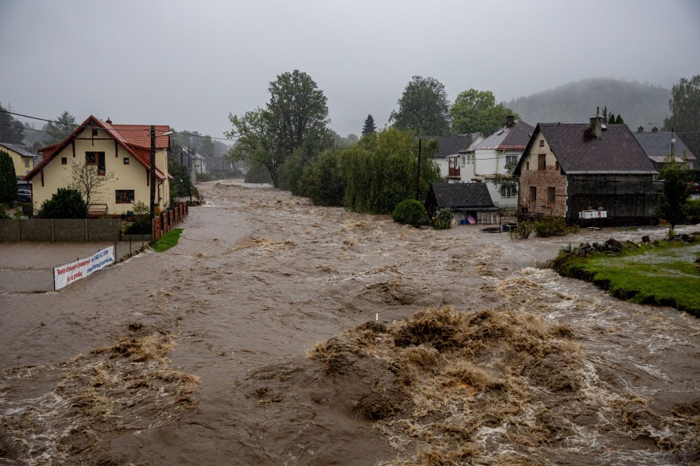 A view of the overflowing of the Staric River on Sunday following heavy rain that hit the village of Lipova-Lazne in the Czech Republic. Floods have been battering central and eastern Europe since Friday, with at least four dead in Romania, one dead in Poland and four missing in the Czech Republic. Photo: EPA-EFE