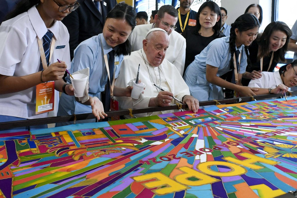 Pope Francis attends an interreligious meeting with young people at Singapore’s Catholic Junior College on Friday. Photo: dpa