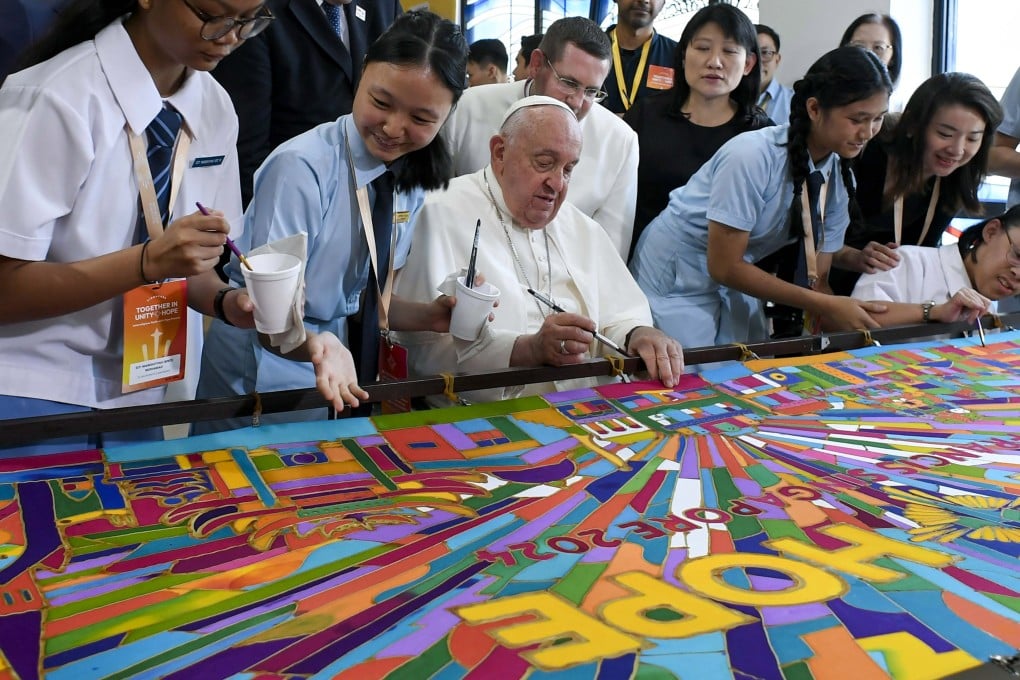 Pope Francis attends an interreligious meeting with young people at Singapore’s Catholic Junior College on Friday. Photo: dpa
