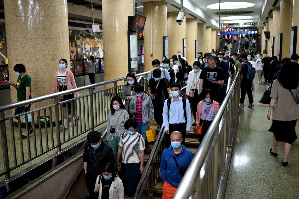 This photo taken on June 2, 2021 shows commuters during rush hour in Beijing. China’s one-child policy has depleted the country’s future supply of workers. Photo: AFP