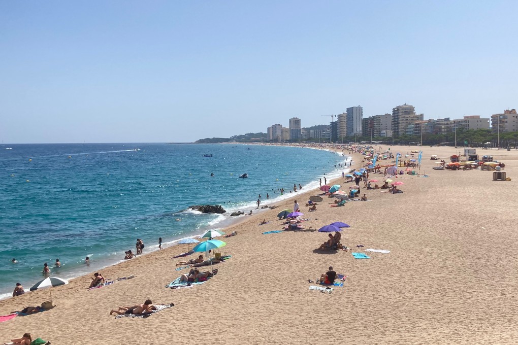 The main beach in the Catalonian holiday resort of Platja D’Aro on July 29, 2024. The beach is a third of the size it was in the 1980s, according to reports, with many beaches on Spain’s Costa Brava coastline similarly suffering from coastal erosion. Photo: Getty Images