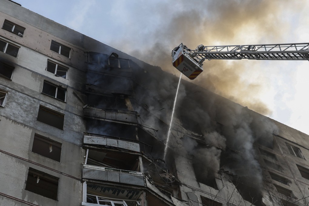 Ukrainian rescuers work at the site of a damaged residential building after shelling in Kharkiv, northeastern Ukraine, on Sunday. Photo: EPA-EFE
