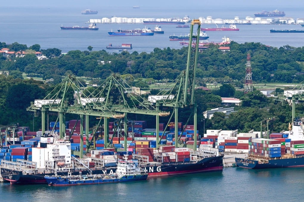 Vessels are seen docked at a container port terminal in Singapore. Photo: AFP