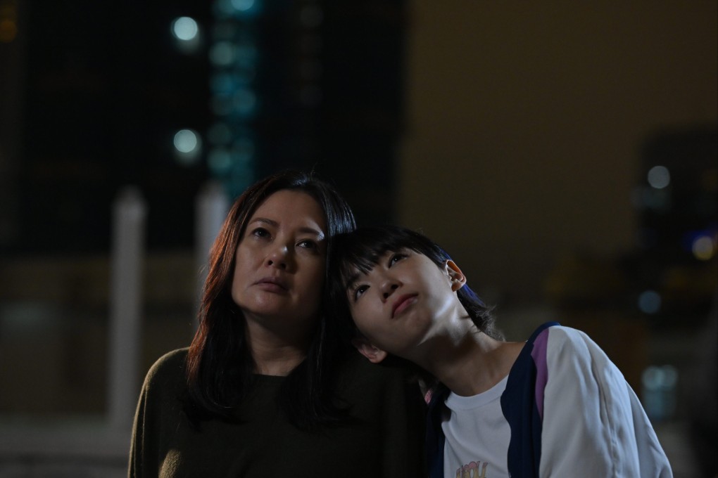 Gladys Li as Mei-chan and Loletta Lee as her mother (left) in a still from Once in a Blue Moon (category IIB, Cantonese), directed by Andy Lo. Peter Chan co-stars.