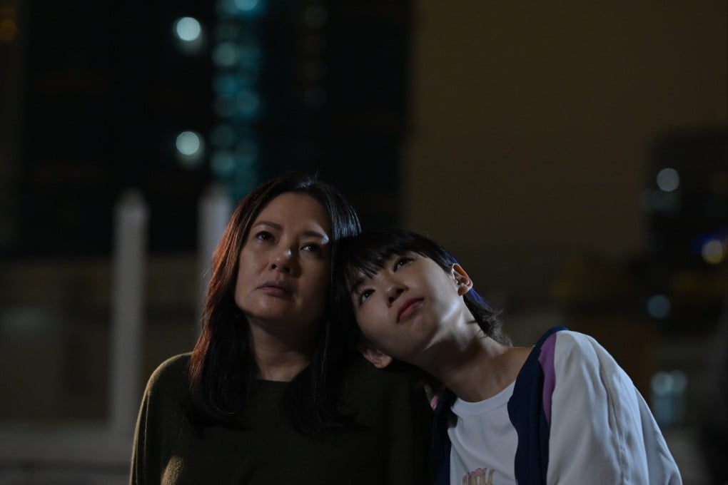 Gladys Li as Mei-chan and Loletta Lee as her mother (left) in a still from Once in a Blue Moon (category IIB, Cantonese), directed by Andy Lo. Peter Chan co-stars.