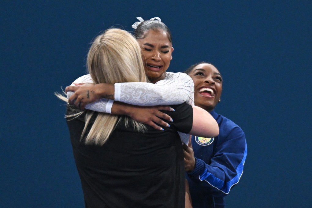 US gymnast Jordan Chiles (centre) celebrates her bronze medal and Simone Biles (right) celebrates her silver in the women’s floor final at the Paris 2024 Olympic Games. Photo: dpa