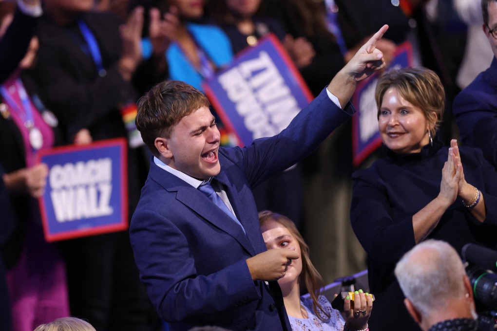 Gus Walz cheers as his father, Minnesota Governor and 2024 Democratic vice-presidential candidate Tim Walz, speaks on the third day of the Democratic National Convention in Chicago on August 21. Photo: AFP