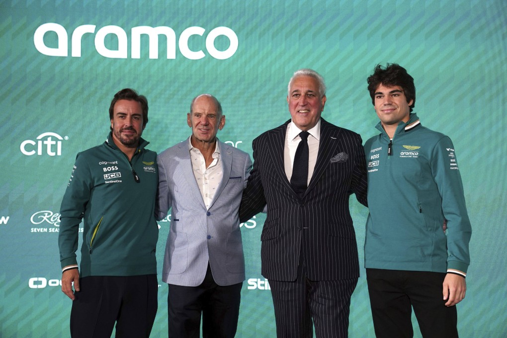 Aston Martin Aramco Formula One Team drivers, Fernando Alonso (left) and Lance Stroll (right) pose with Adrian Newey, newly appointed managing technical partner and Lawrence Stroll, executive chairman. Photo: AP