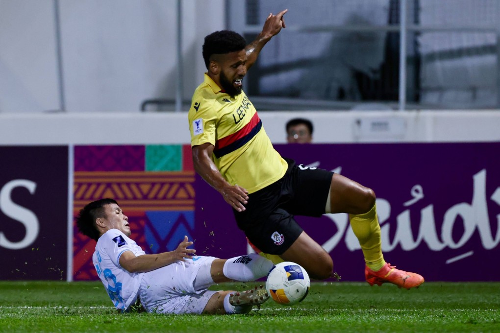 Lee Man’s Samuel Rosa (right) is tackled by Nam Dinh’s To Van Vu during their side’s AFC Champions League Two clash at Mong Kok Stadium. Photo: Jonathan Wong