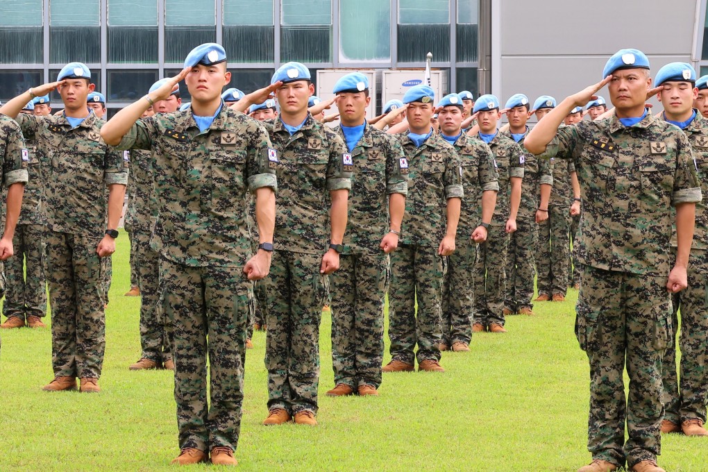 South Korean soldiers bound for a UN peacekeeping mission in Lebanon salute at a military base in Incheon, South Korea, last month. Photo: Yonhap/EPA-EFE