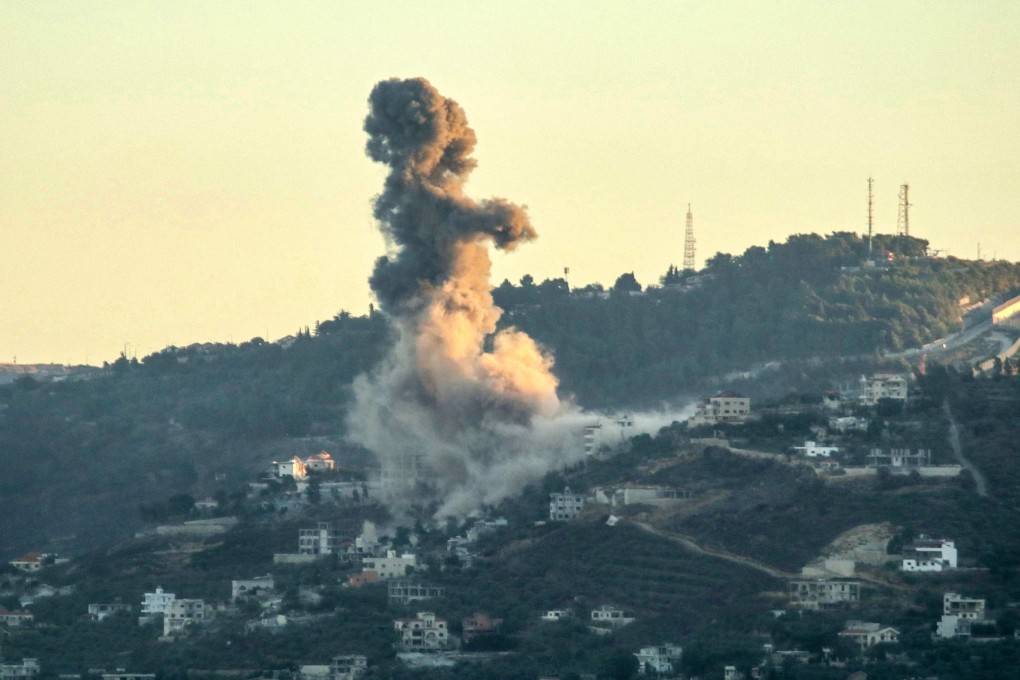 Smoke billows from the site of an Israeli strike targeting the southern Lebanese village of Odaisseh on Wednesday. Photo: AFP