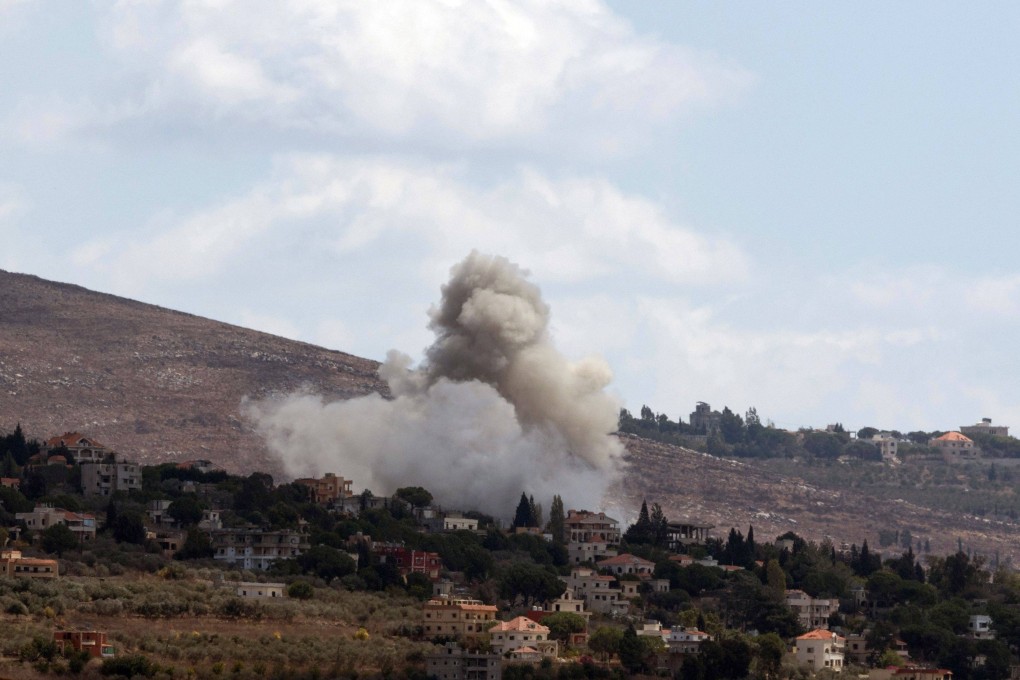 Smoke billows from the site of an Israeli airstrike that targeted an area in the southern Lebanese village of al-Taybeh. Photo: AFP